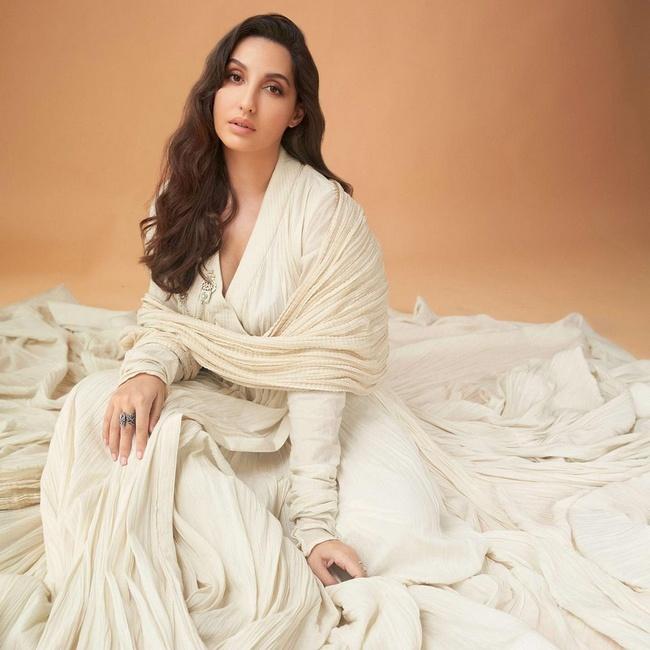 Actress Nora Fatehi Stunning Looks in White Dress