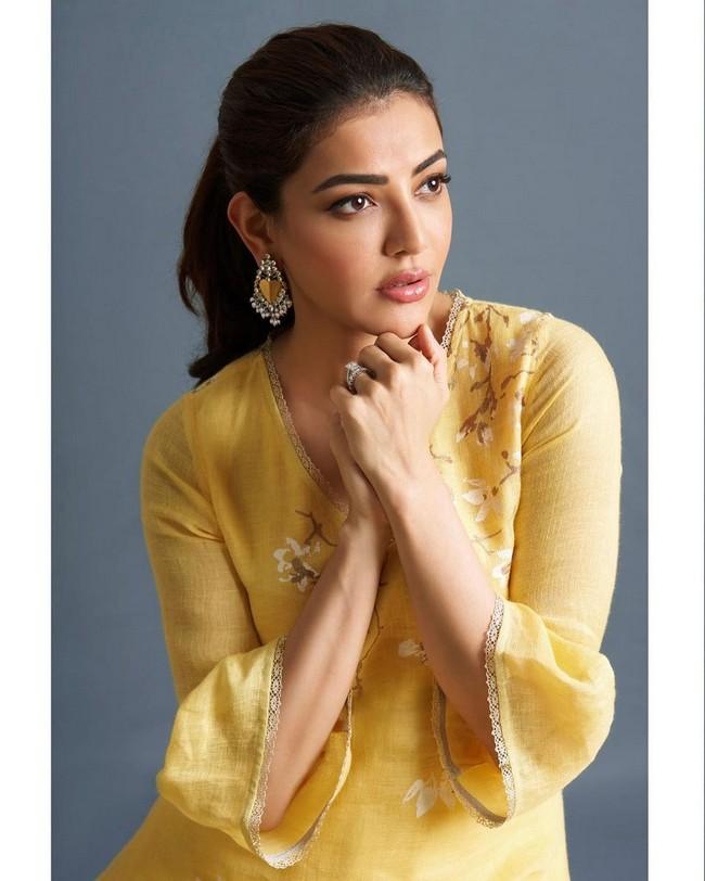 Kajal Aggarwal Cute Looks in yellow Dress