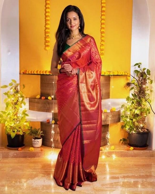 Shanvi Srivastava Looking Cute in Shiny Silk Red Saree