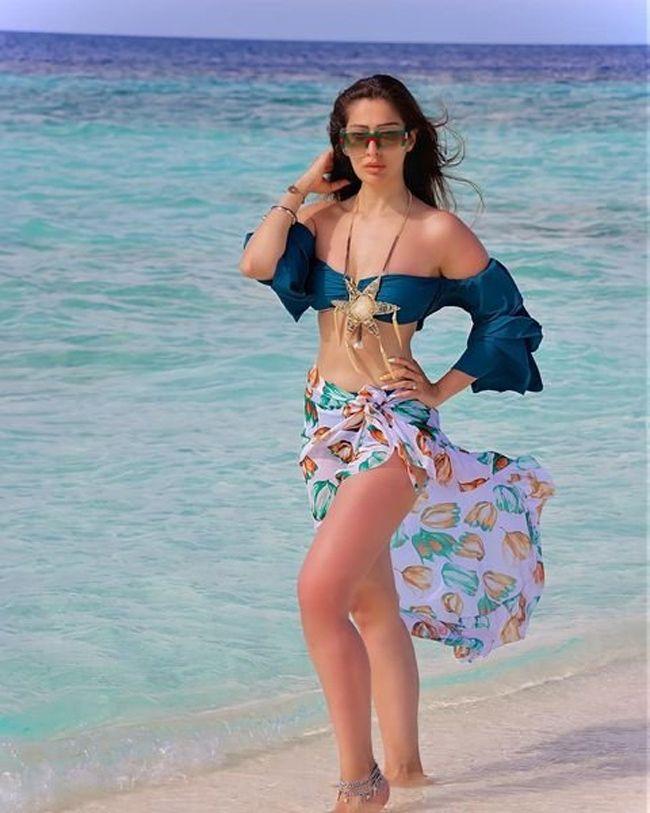 Raai Laxmi Tempting With Her Alluring Poses In Beach