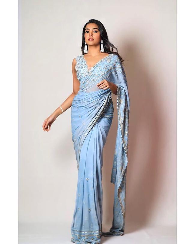 Shivathmika Adorable Pics In Blue Saree