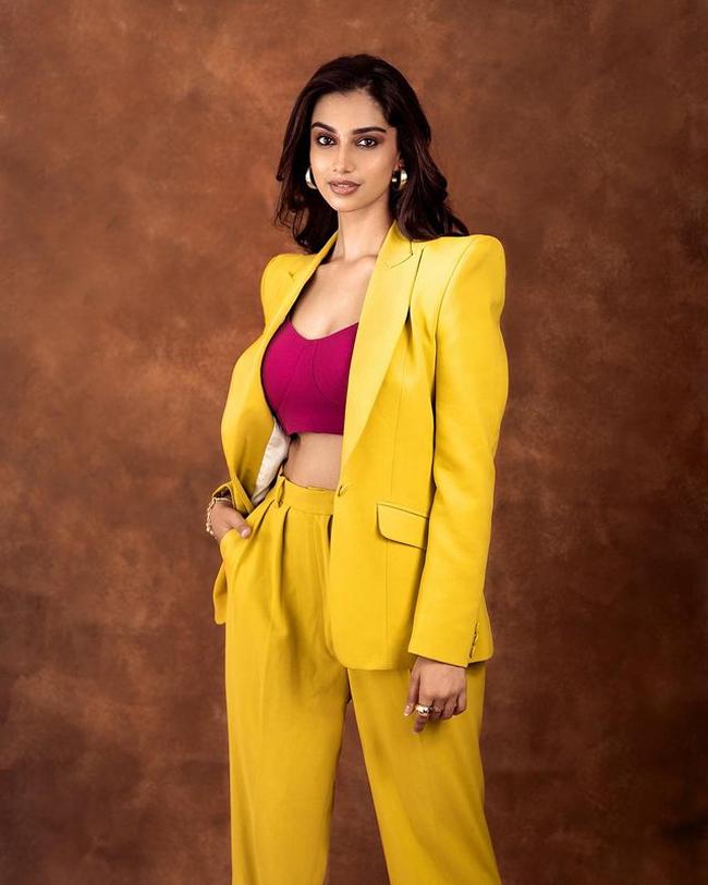 Meenakshi Chaudhary Looking Too Stylish In Yellow Suit