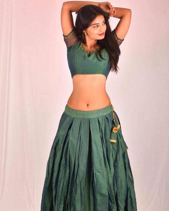 Ananya Nagalla Flaunts Her Waist In Green Outfit