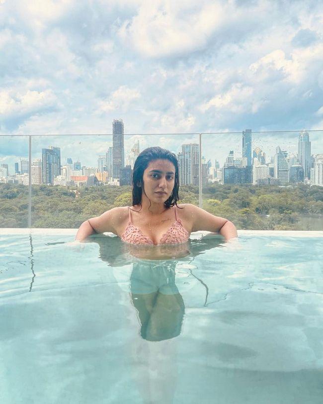 Priya Varrier Teases With Poses In Swimming Pool