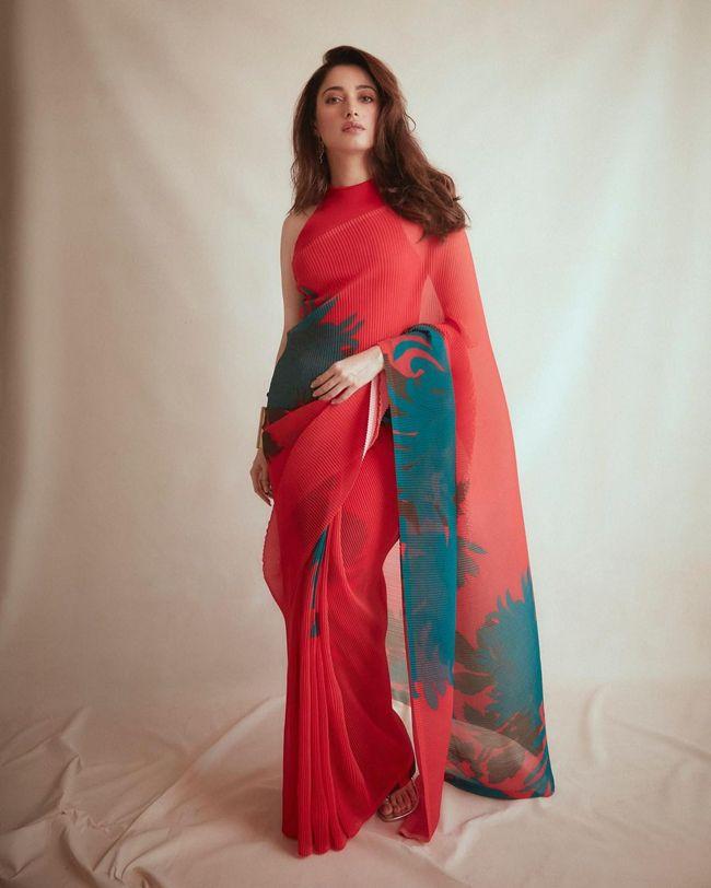 Tamannaah Exquisite Looks In Red Saree
