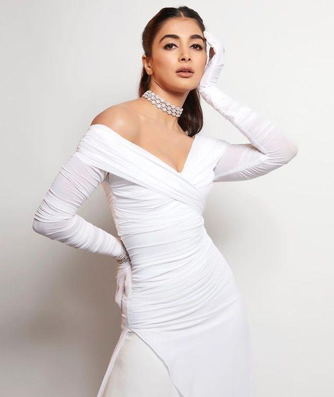 Dazzling Pooja Hegde Poses In Complete White