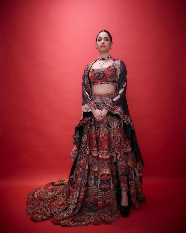 Tamannaah Exquisite Looks In Red Saree