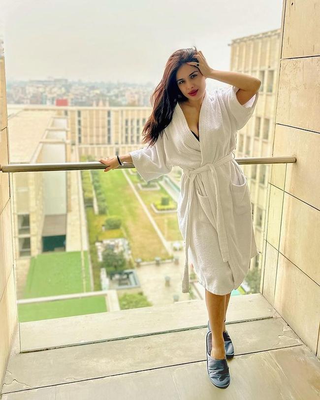 Nehhaa Malik Flaunts Her Beauty In White Robe