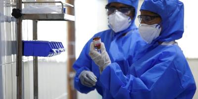 Medical staff with protective clothing inside a ward specialised in receiving any person who may have been infected with coronavirus, at the Rajiv Ghandhi Government General hospital in Chennai. Photo: Reuters/P. Ravikumar/File Photo
