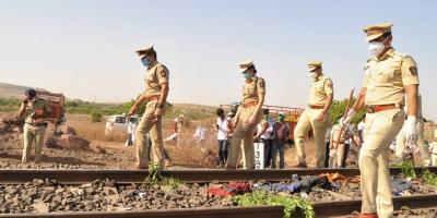 Police inspect the spot where a goods train ran over a group of migrant workers in Aurangabad district, May 8, 2020. Photo: PTI 