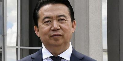 Interpol President Meng Hongwei poses during a visit to the headquarters of International Police Organisation in Lyon, France, May 8, 2018. Credit: Jeff Pachoud/Pool via Reuters