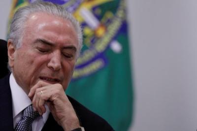 Brazil's President Michel Temer reacts during a meeting with government leaders of the Brazilian federal senate, at the Planalto Palace in Brasilia, Brazil May 9, 2017. Credit:Reuters