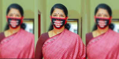Kanimozhi, in a mask that says 'Justice for Jeyaraj and Fenix.' Photo: Author provided