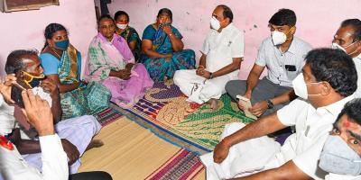 Tamil Nadu information minister Kadambur Raju and other AIADMK leaders meet the victims' family. Photo: PTI