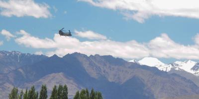 An Indian army Chinook helicopter flies from Air force base in the backdrop of a Himalayan mountain range, amid border tensions with China, in Leh, Wednesday, July 1, 2020.  Photo: PTI