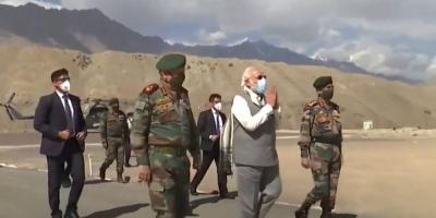 Prime Minister Narendra Modi along with Chief of Defence Staff Gen Bipin Rawat (L) arrives for an interaction with Army  personnel in Leh, July 3, 2020. Photo: PTI