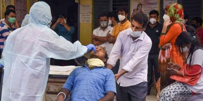 A man gets tested for the coronavirus at a camp in Patna. Photo: PTI