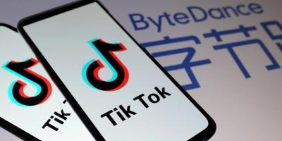 TikTok logos are seen on smartphones in front of a displayed ByteDance logo in this illustration taken November 27, 2019. 
Photo: REUTERS