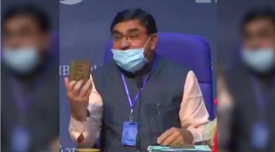 A video screengrab of RKA's Vallabhbhai Kathiria unveiling the cow dung chips. 