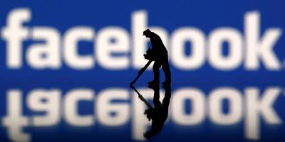 File Photo: A figurine is seen in front of the Facebook logo in this illustration taken March 20, 2018. Photo: Reuters/Dado Ruvic
