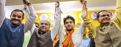 BJP leader Jyotiraditya Scindia with party leader Shivraj Singh Chouhan, Union Minister Narendra Singh Tomar, State BJP President VD Sharma at party headquarters in Bhopal, Thursday, March 12, 2020. Photo: PTI 