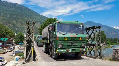 Indian army trucks depart towards Ladakh amid standoff between Indian and Chinese troops in eastern Ladakh, at Manali-Leh highway in Kullu district. Photo: PTI