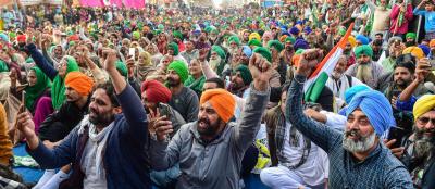 Farmers listen to their leaders speech during their ongoing protest at Tikri border, a day after the farmers tractor rally, in New Delhi, Wednesday, Jan. 27, 2021. Photo: PTI/ Kamal Kishore