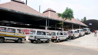 Ambulances, carrying bodies of people who died of COVID-19, parked outside the Jahagirpura Crematorium for their last rites, as coronavirus cases surge countrywide, in Surat, Wednesday, April 14, 2021. Photo: PTI