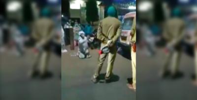 A video screengrab showing Anmol Goyal pleading with Agra police. Photo: Twitter