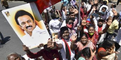 DMK Party workers celebrate during the counting day of Tamil Nadu Assembly polls result at their party headquarters, in Chennai, Sunday, May 2, 2021. Photo: PTI