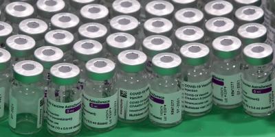 Empty vials of the Oxford-AstraZeneca COVID-19 vaccine in Antwerp, Belgium March 18, 2021. Photo: Reuters/Yves Herman