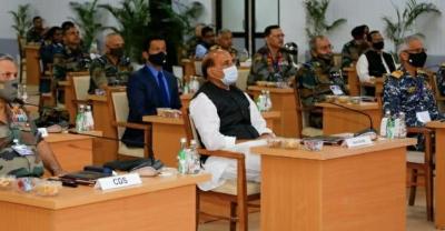 Union Defence Minister Rajnath Singh at the Combined Commanders’ Conference at Kevadia in Narmada district of Gujarat, Friday, March 5, 2021. Also seen are Chief of Defence Staff General Bipin Rawat and Chief of Naval Staff Admiral Karambir Singh. Photo: PTI.