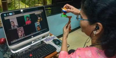 Neeta Dhuri, a teacher for hearing impaired students, takes an online speech therapy session of parents and students during the COVID-19 lockdown in Mumbai. Photo: PTI