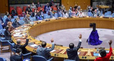 The Security Council unanimously adopts resolution  2585 (2021) extending the cross-border mechanism for humanitarian aid in northwest Syria. Photo: UN Photo/Loey Felipe