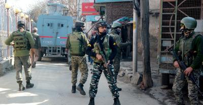 Security personnel conduct a Cordon and Search Operation (CASO) at Baghat Chowk, after three unidentified militants and three policeman were killed in three separate encounters in Srinagar, Budgam and Shopian districts Jammu and Kashmir, in Srinagar, Friday, Feb.19, 2021. Photo: PTI
