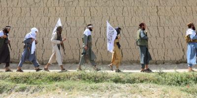 FILE PHOTO: Taliban walk as they celebrate ceasefire in Ghanikhel district of Nangarhar province, Afghanistan June 16, 2018. Credit: REUTERS/Parwiz