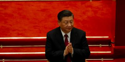 Chinese President Xi Jinping applauds at the closing session of the Chinese People's Political Consultative Conference (CPPCC) at the Great Hall of the People in Beijing, China March 10, 2021. Photo: Reuters/Carlos Garcia Rawlins/File