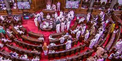 Opposition MPs shout slogans demanding a discussion on Pegasus Project report in Rajya Sabha during the Monsoon Session of Parliament, in New Delhi, Monday, July 26, 2021. Photo: PTI