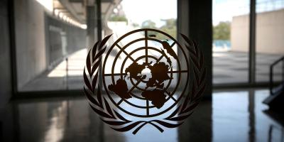 The United Nations logo is seen on a window in an empty hallway at the UN headquarters in New York, US, September 21, 2020. Photo: Reuters/Mike Segar/File Photo/File Photo