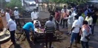 The cremation outside the panchayat office. Photo: Screengrab from video