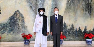 Chinese State Councilor and Foreign Minister Wang Yi meets with Mullah Abdul Ghani Baradar, political chief of Afghanistan's Taliban, in Tianjin, China July 28, 2021.  Photo: Li Ran/Xinhua via Reuters