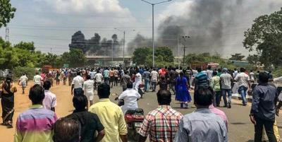 Smoke billows from the site of protests against the Sterlite unit in Thoothukudi. Photo: PTI/Files