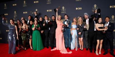 The cast and crew members of comedy series 'Ted Lasso' pose for a picture with their awards at the 73rd Primetime Emmy Awards in Los Angeles, US, September 19, 2021. Photo: Reuters/Mario Anzuoni