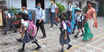Students arrive to attend classes at a school that was reopened after COVID-19 restrictions were eased in Moradabad, September 1, 2021. Photo: PTI 