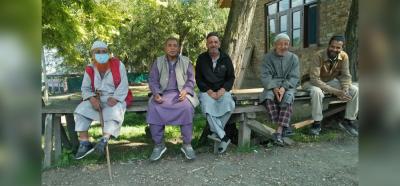 Elderly men socialising after lunch at Lepers Colony in Kashmir. Photo: By arrangement.  