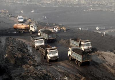 Trucks move in the Mahanadi coal fields, near Talcher town in Odisha, March 28, 2012. Photo: Reuters/Rupak De Chowdhuri/File Photo