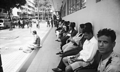 Representative image of commuters waiting in Malaysia. Photo: Flickr/Harris Nasution. 