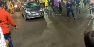 Video screengrab of the car ramming into people in the Bhopal Durga idol procession. 