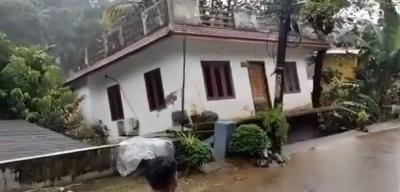 A house collapses in Kerala after the floods. Photo: Twitter@srinivasiyc