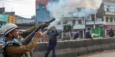 Police fire tear gas shells on protesters in Patna on December 21. Photo: PTI